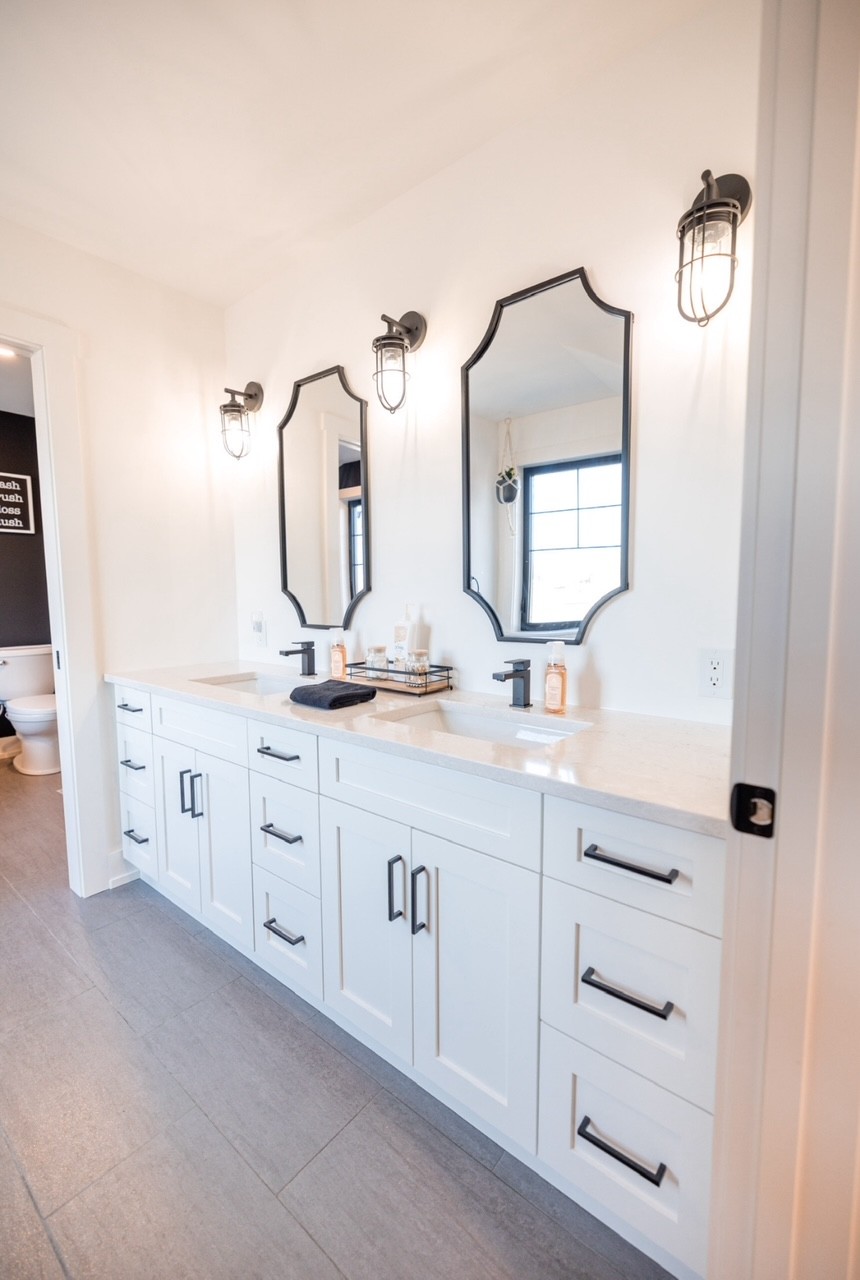 White bathroom with double sinks